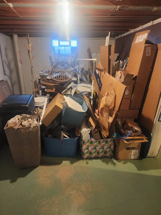 Roll-off dumpster container at job site for 20 Yard Dumpster Rental in Conley